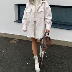 All white heeled boots